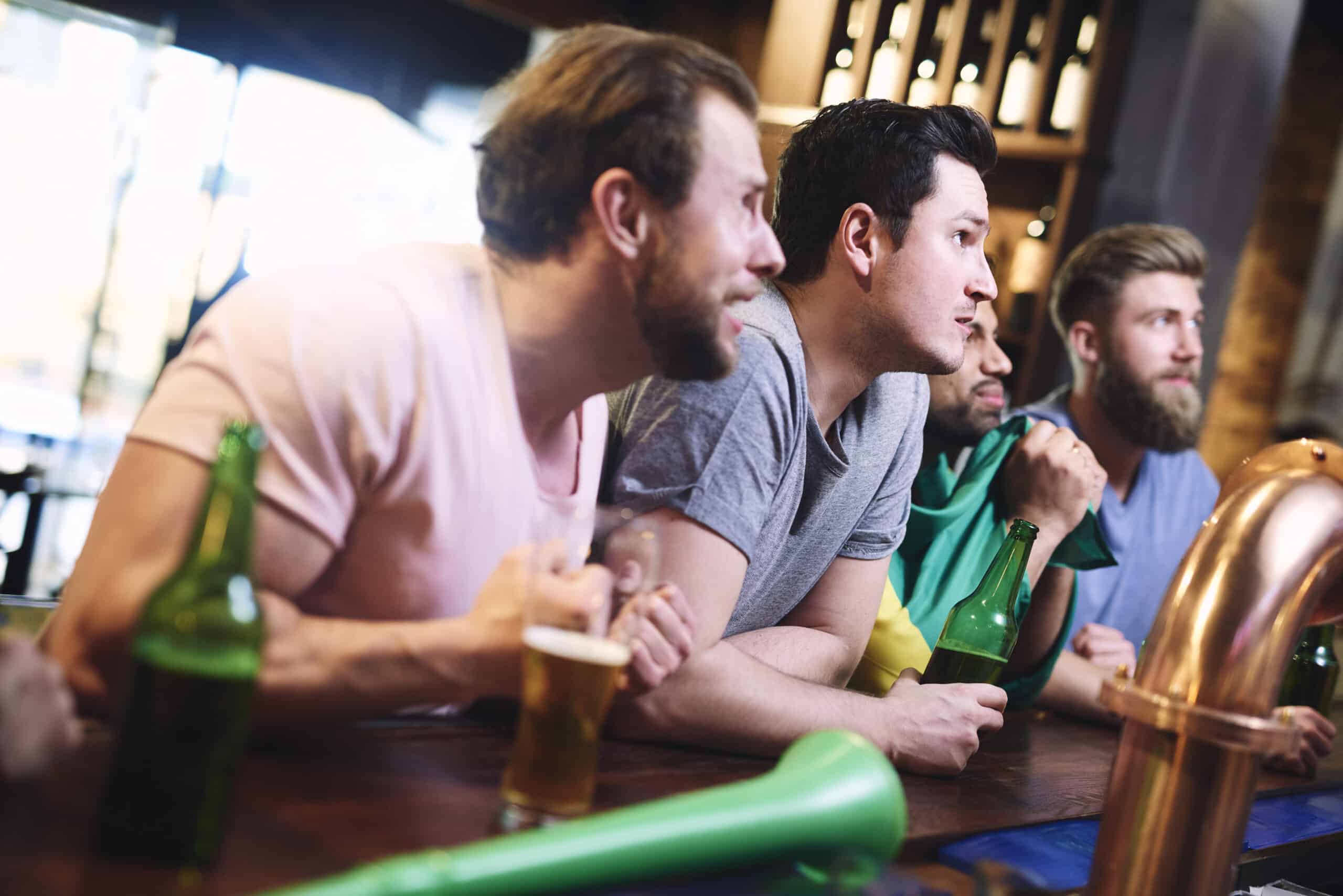 Sports pub with multiple screens streaming live matches via Click Telecom WiFi